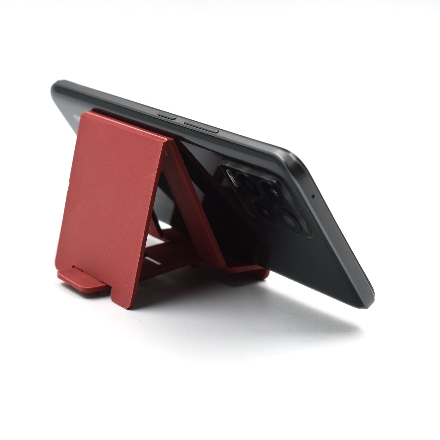 Adjustable phone stand, ideal for holding devices at home or work. Adjustable phone stand, ideal for holding devices at home or work.